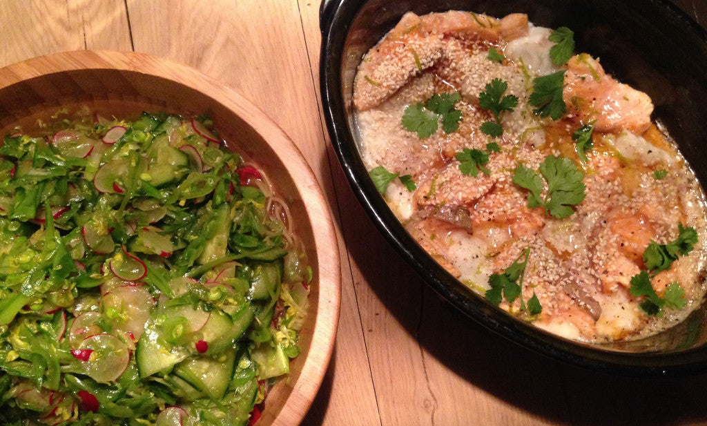 Fresh noodle bowl with salmon and white fish, vegetables and a spicy broth