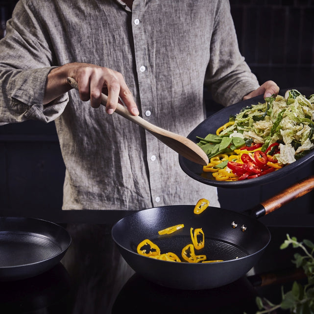 Is it your fault if your wok simmers more than it sears on induction?