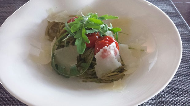Fresh, homemade pesto with roasted pine nuts and candied cherry tomatoes