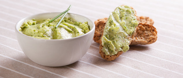 Homemade herb butter with garlic, lemon and fresh herbs