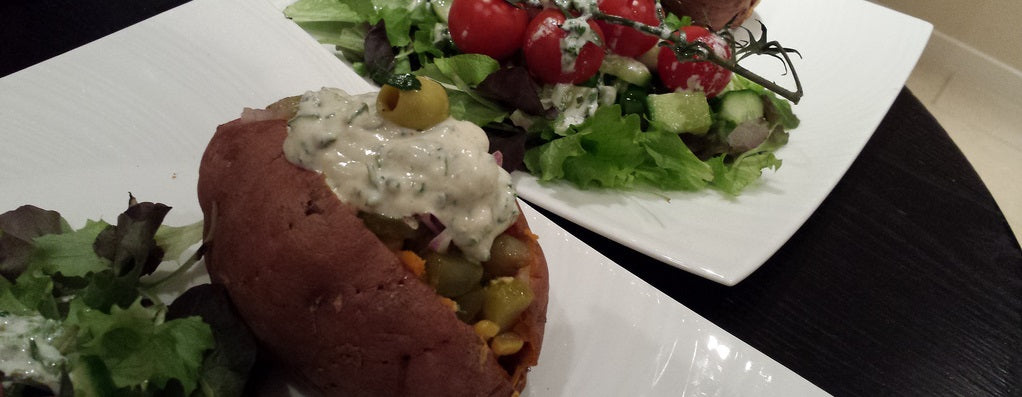 A nutritious and colourful meal with stuffed sweet potato