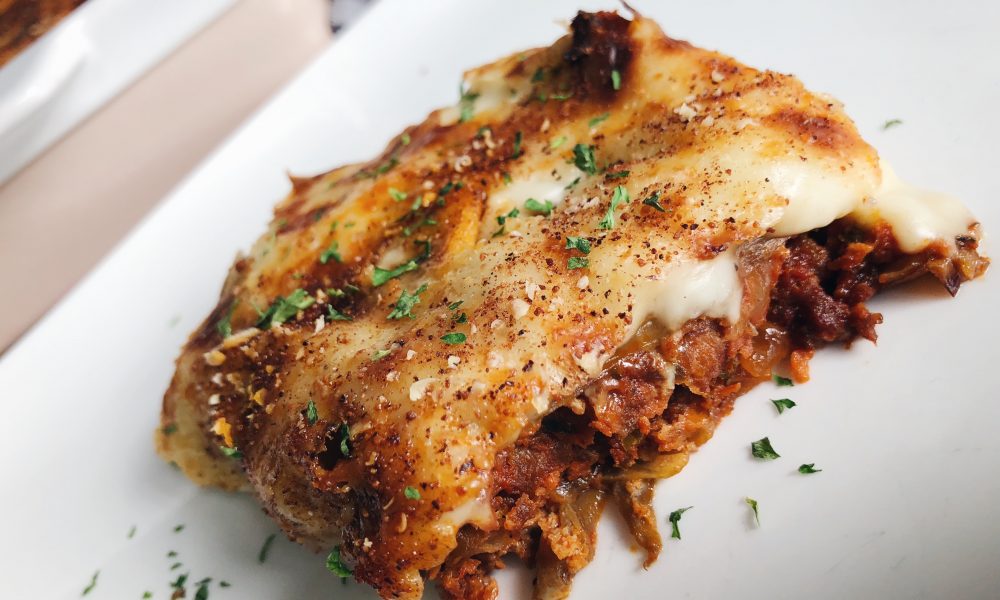 A classic Greek baked dish with aubergine, seasoned mince and creamy béchamel sauce
