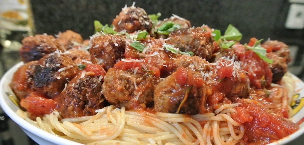 A classic Italian favorite with juicy meatballs in a rich tomato sauce