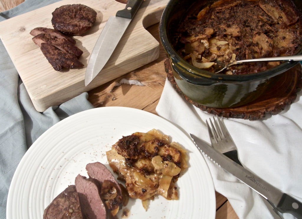 Juicy venison steak with a creamy potato gratin bursting with woodland mushroom flavour