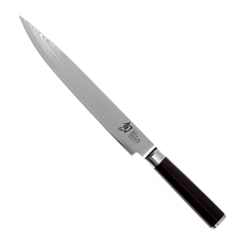 Kai Vleesmes Shun Classic 23 cm damaststaal met zwart heft, vrijstaand op witte achtergrond
