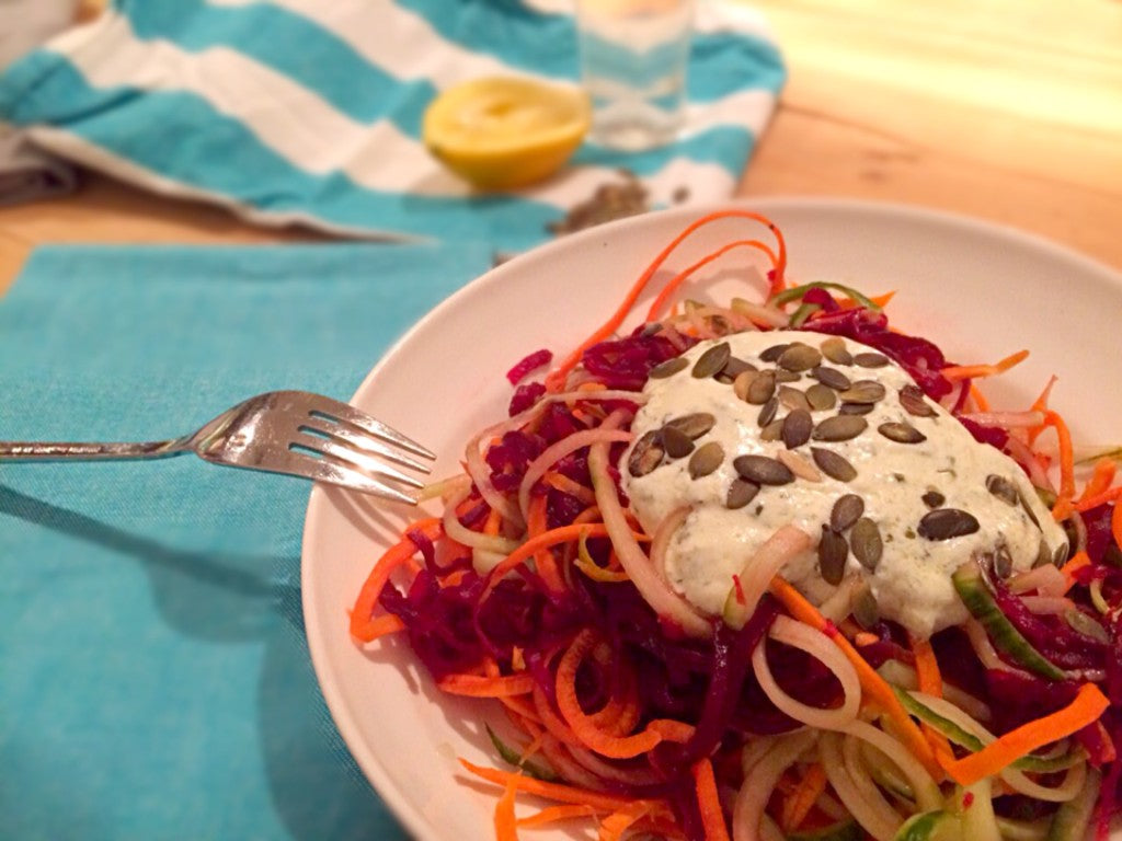 Fresh raw vegetable spaghetti with a creamy yogurt-lemon dressing