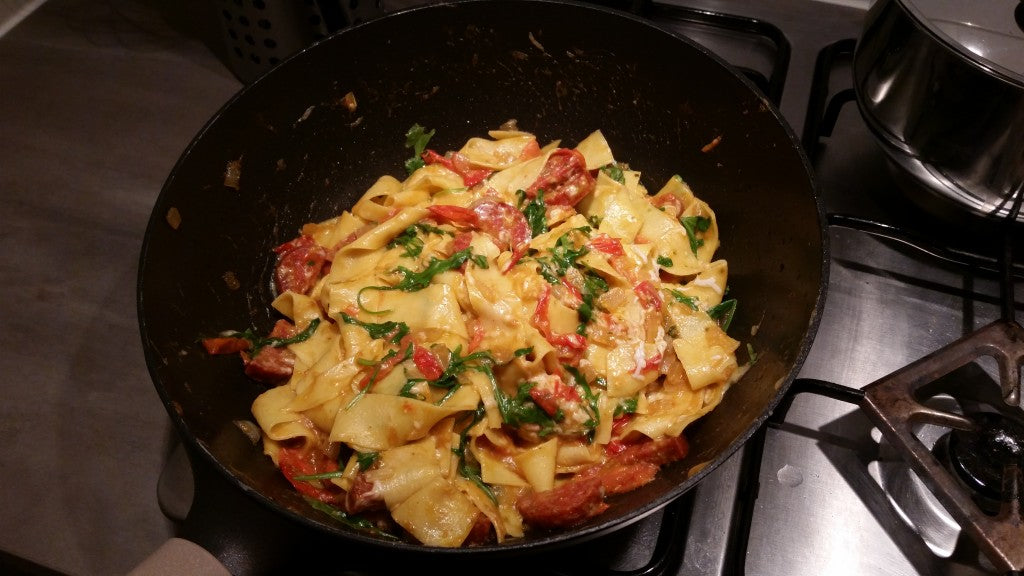 A flavorful pasta dish with spicy chorizo and creamy goat cheese