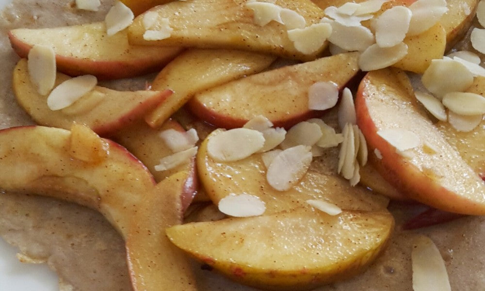 Light buckwheat pancakes with caramelised apple and almonds