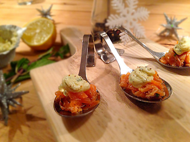An elegant festive bite with smoked salmon and creamy herb cheese