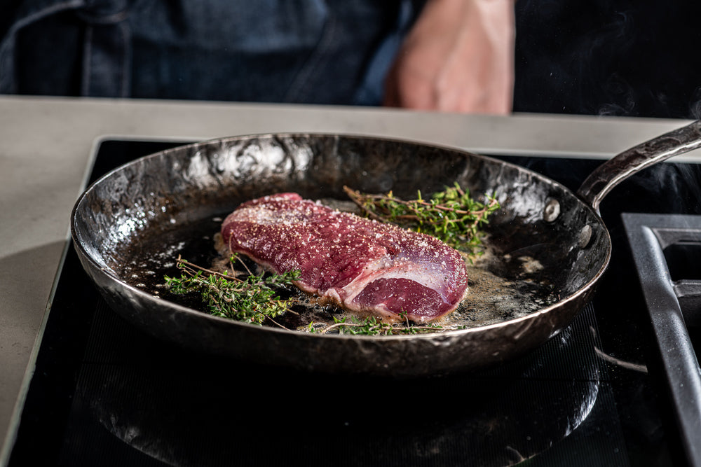 Forged Frying pan carbon steel – suitable for BBQ – Ø 24 cm – suitable for all heat sources