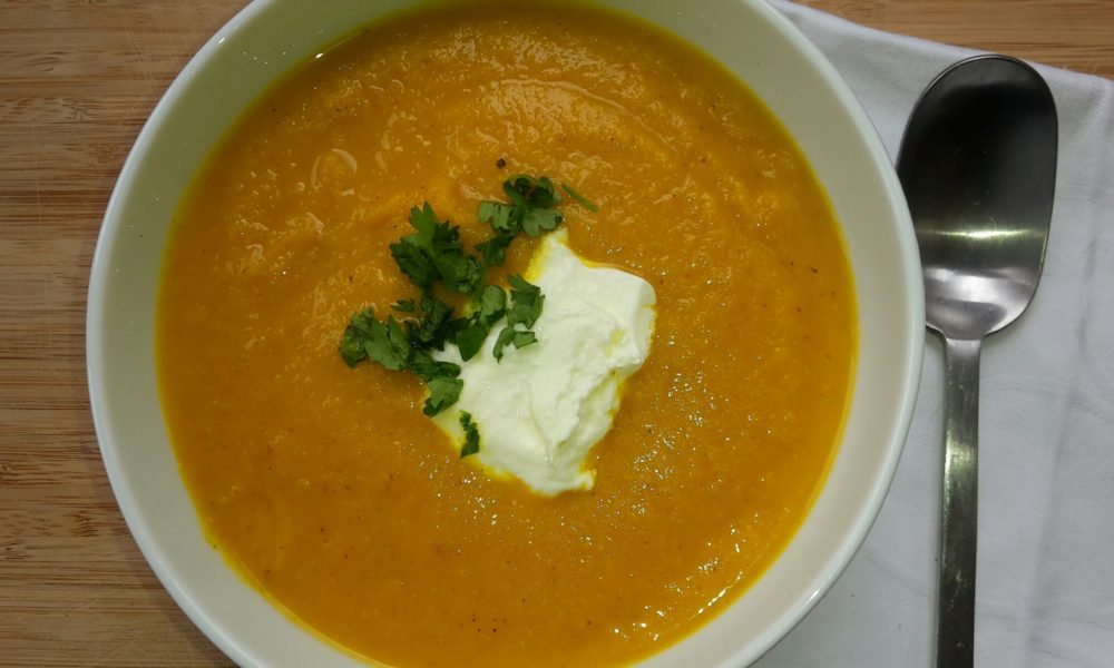 A creamy, spiced carrot soup with a hint of curry and fresh coriander